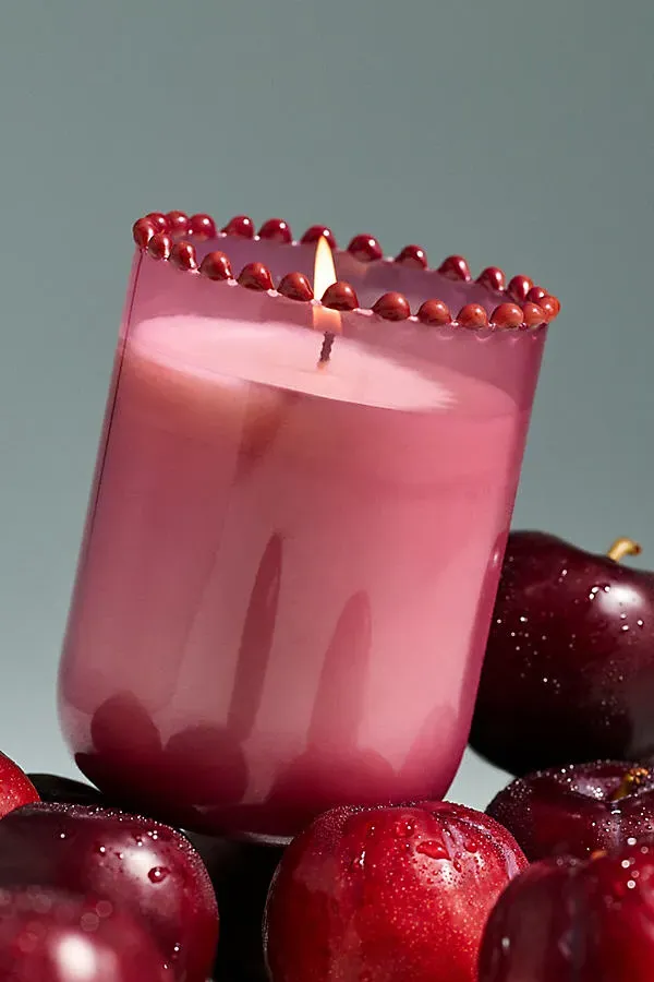 Dotted Rim Vanilla & Dark Plum Glass Candle - Red by Anthropologie