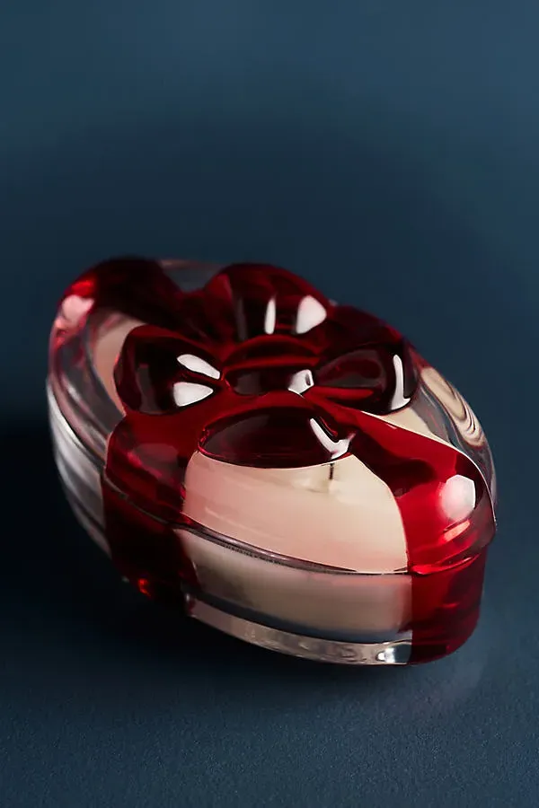 Figural Bow Sugar Plum & Vanilla Woods Glass Candle by Anthropologie, alternate view