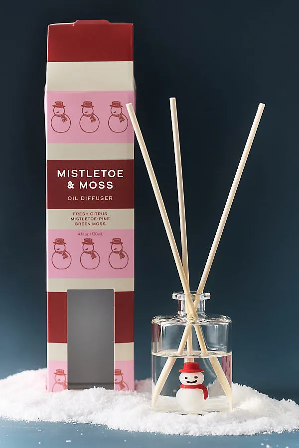 Holiday Icon Woody Mistletoe & Moss Glass Reed Diffuser by Anthropologie