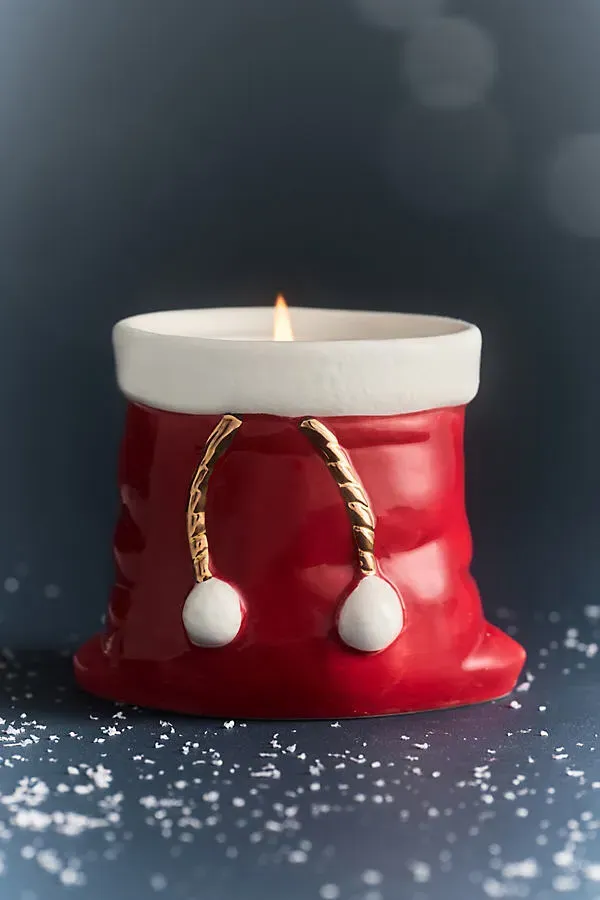 Santa's Bag Woody Noel Pine Ceramic Candle - Red by Anthropologie