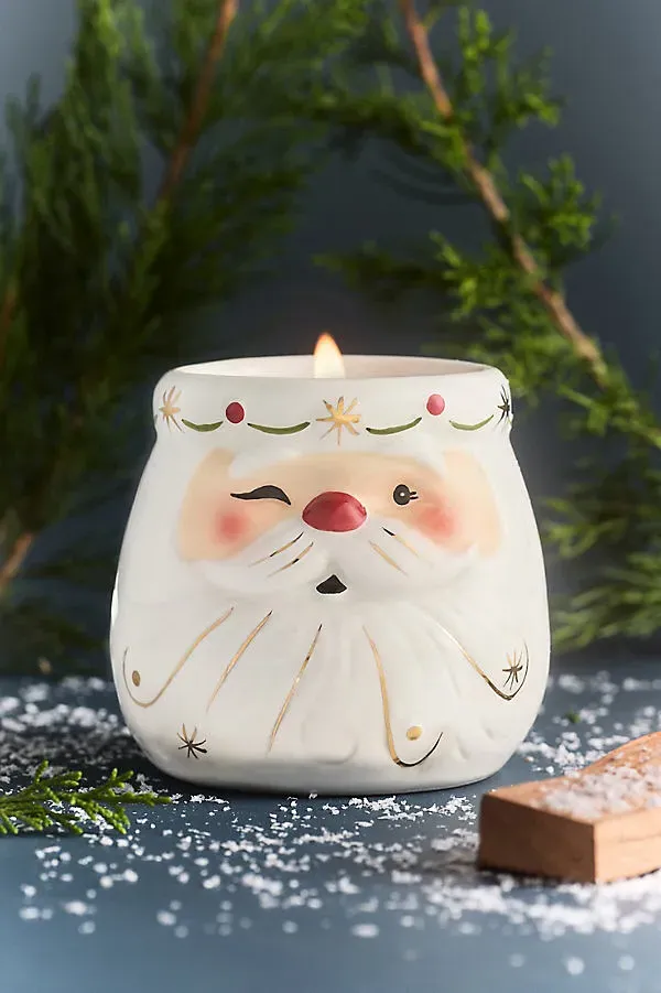 Winking Santa Balsam & Cedarwood Ceramic Candle - White by Anthropologie