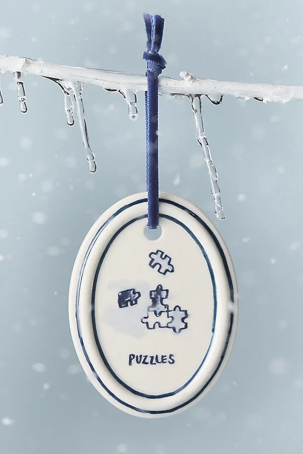 Molly Hatch Oval Hand-Painted Hobby Ornament - Stoneware by Anthropologie