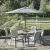 Gabriela 6 Seat Dining Set with Lazy Susan and Parasol