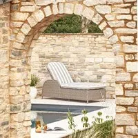 Karla Rattan Sunlounger with Striped Cushion - Sand