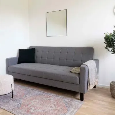 Milton Click Clack Sofa Bed with Black Legs - Dark Grey, Fabric