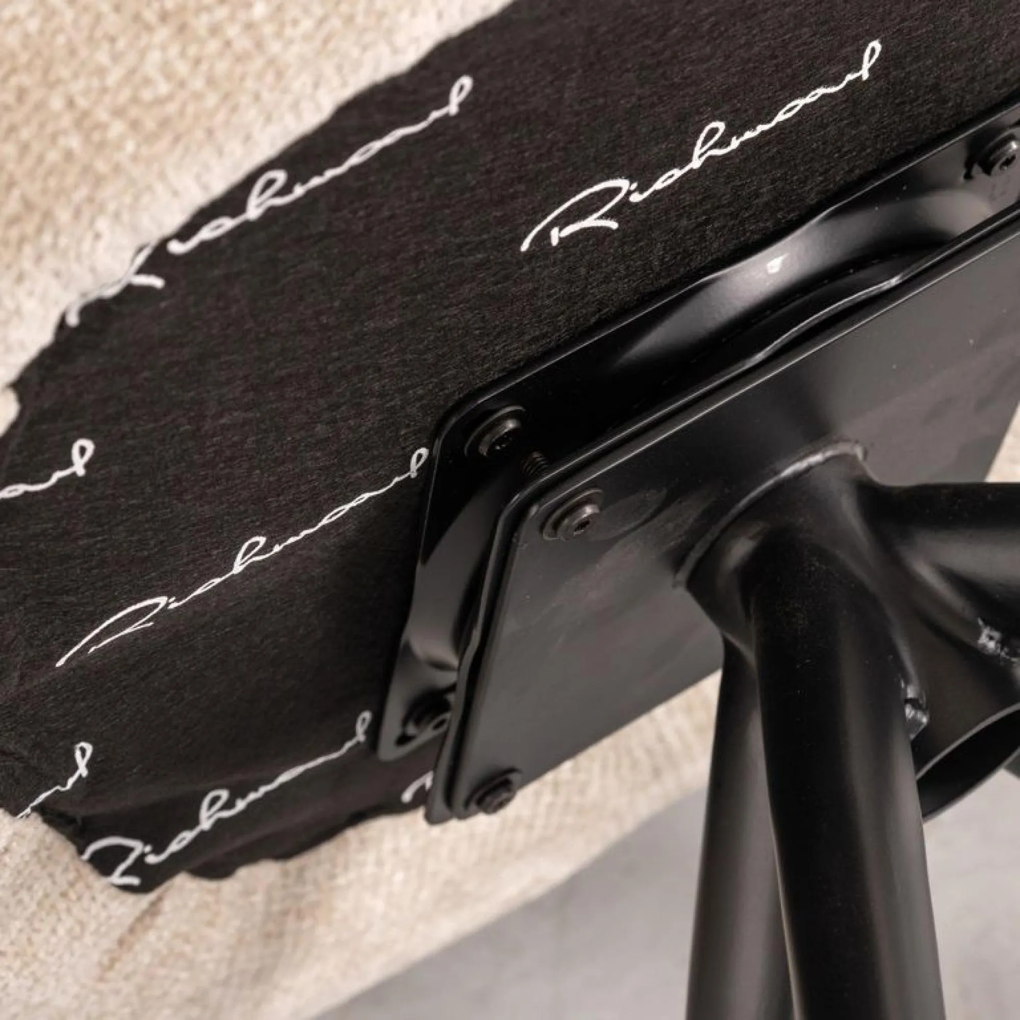 Kayla Swivel Dining Chair - Cream Fabric, Black Legs