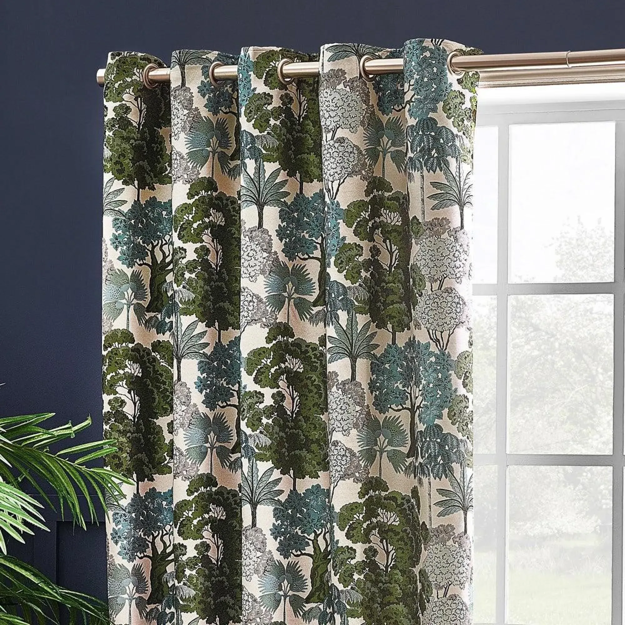 Woodlands Room Darkening Eyelet Curtains - Green