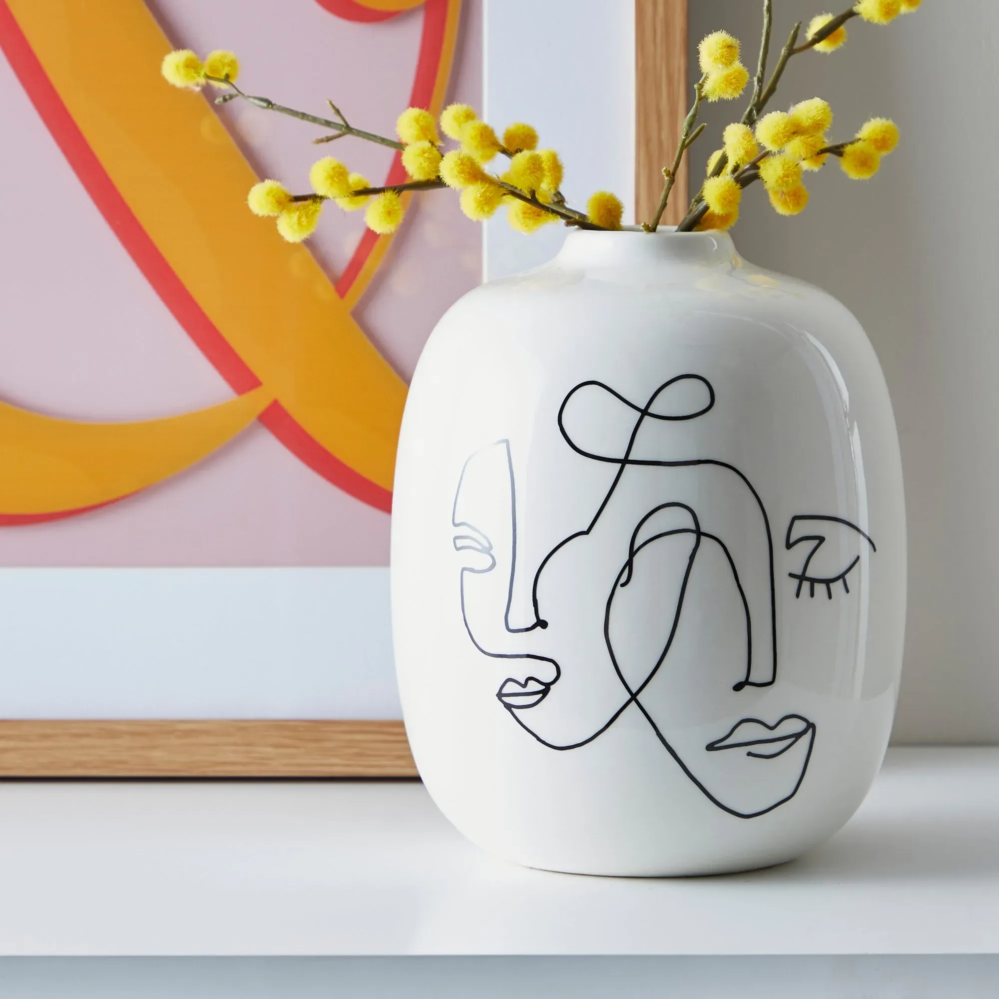 ceramic-face-vase-black-white image