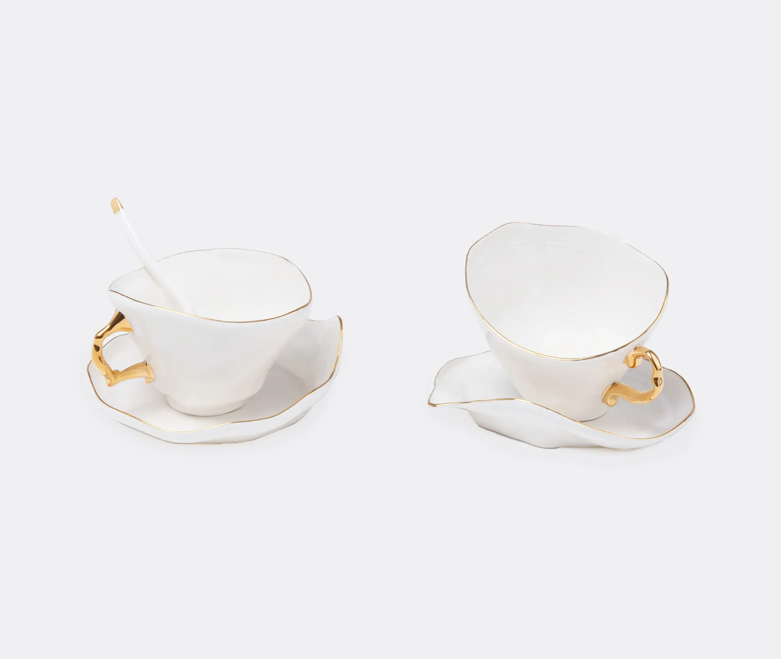 Seletti Meltdown Teacup, Saucer & Teaspoon Set of Two - White, Porcelain product