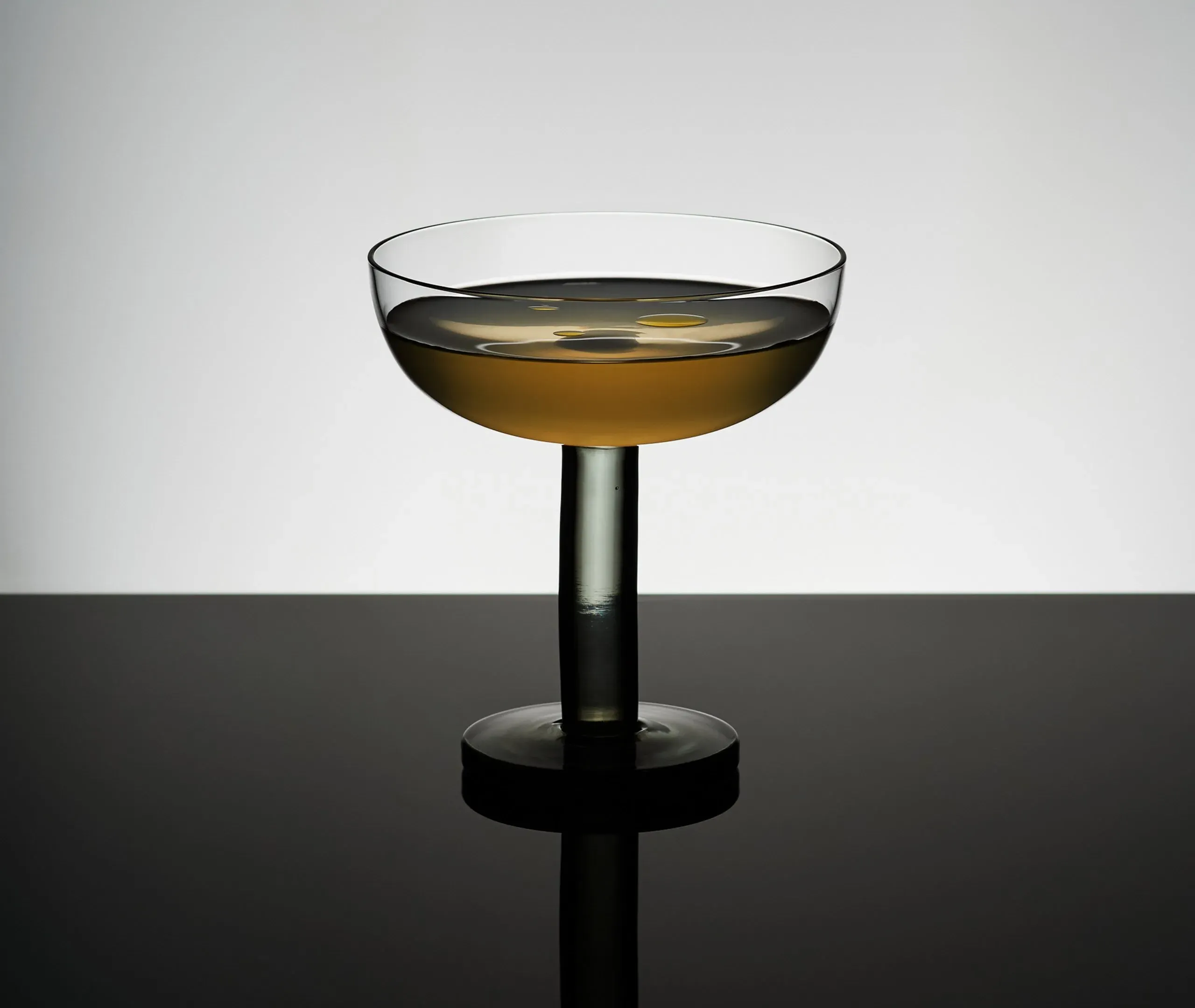 Puck Coupe Glass Set of Two - Clear, Black Base