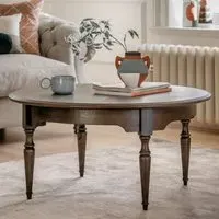 Madisen Round Coffee Table - Coffee