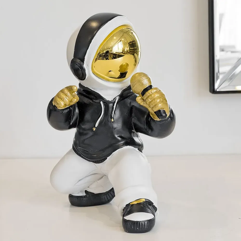 Nicolet Singer Astronaut Sculpture - Black, White, Gold