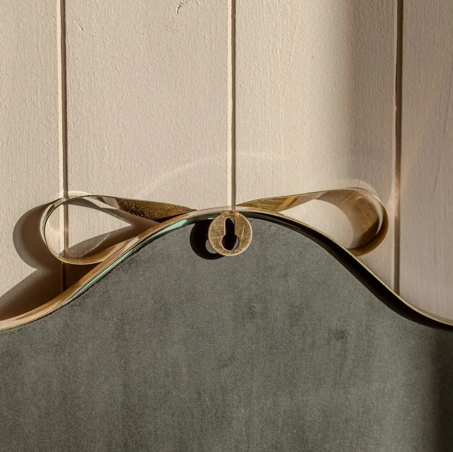 Bow Wall Mirror - Antique Brass