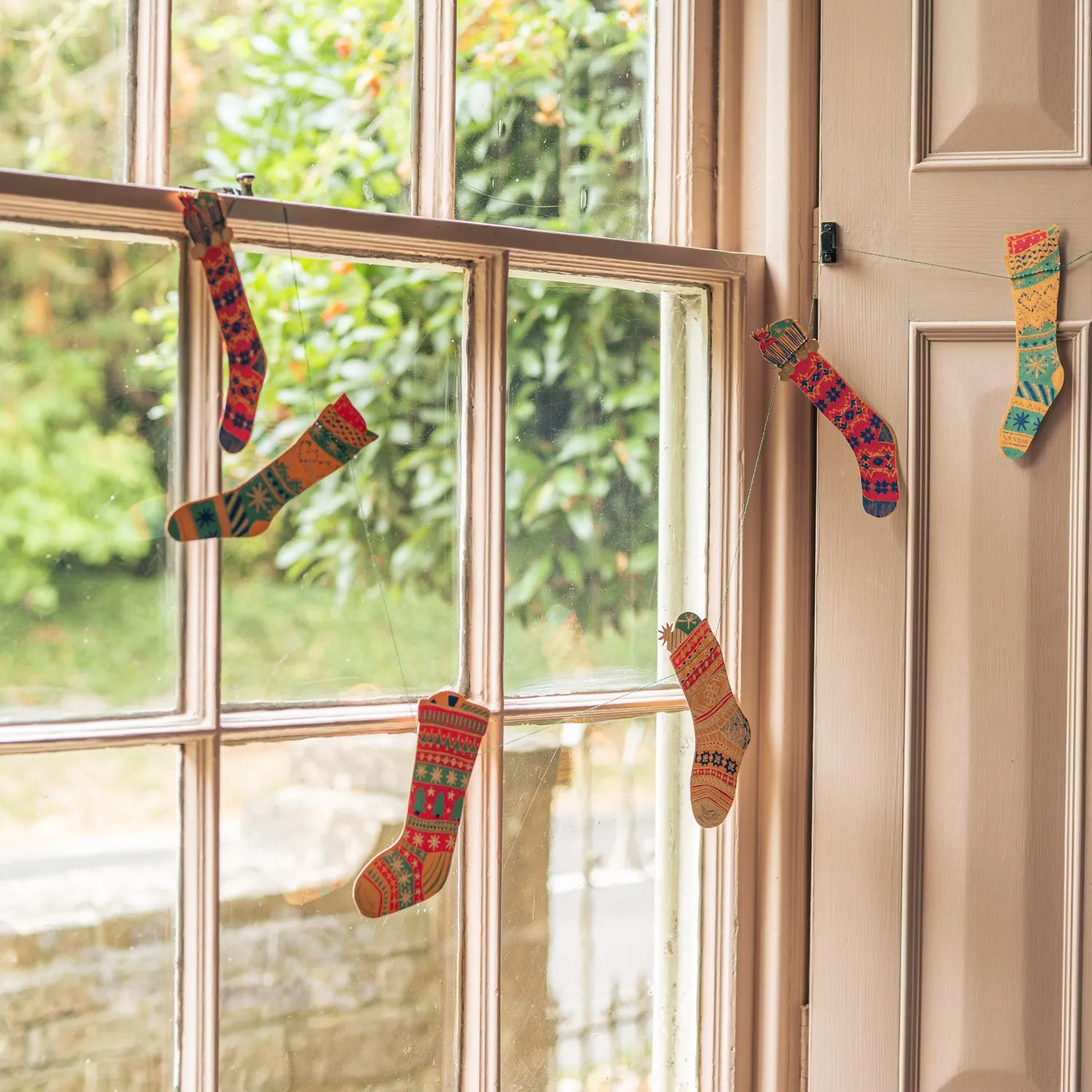 Festive Stockings Garland - Paper image