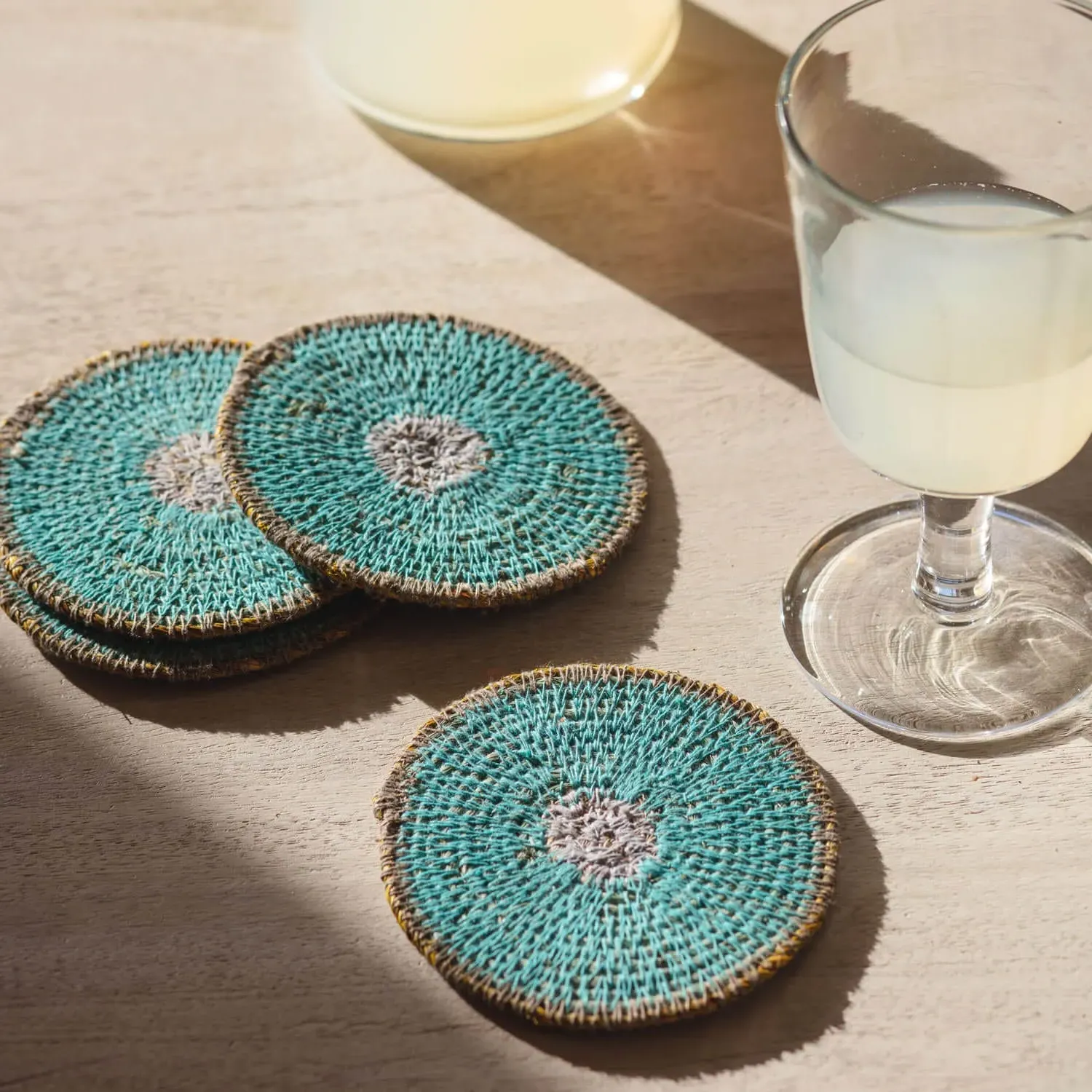 Pablo Set of Four Round Placemats - Orange, Seagrass