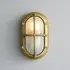 Small Oval Bulkhead Light with Guard - Brass