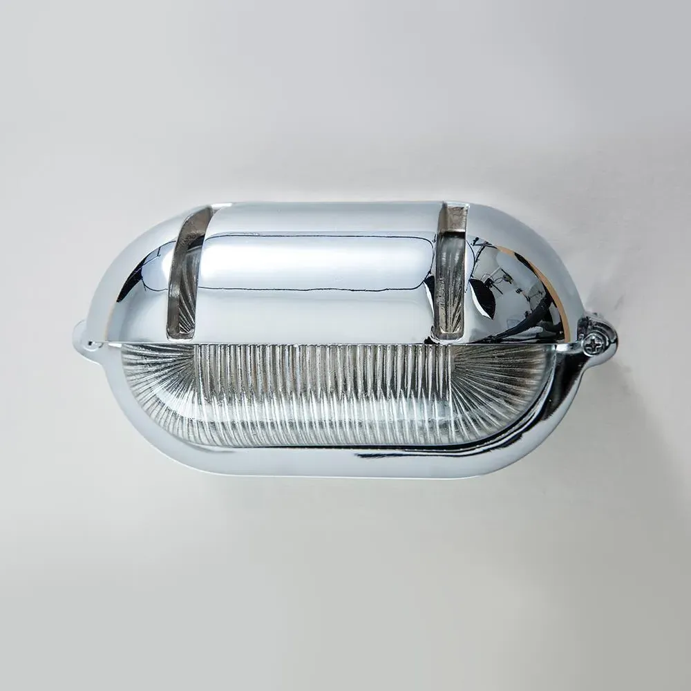 Oval Bulkhead Light with Eyelid - Brass