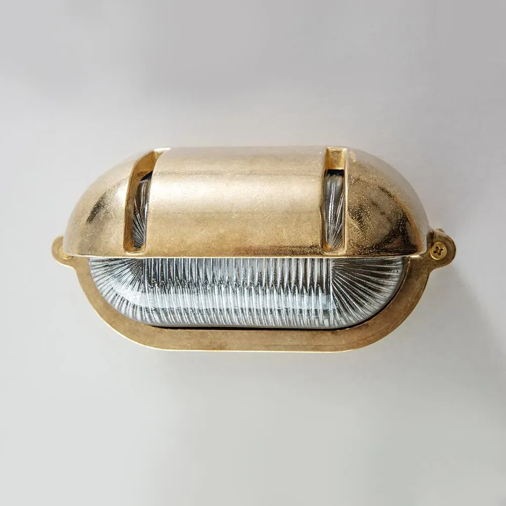 Oval Bulkhead Light with Eyelid - Brass image
