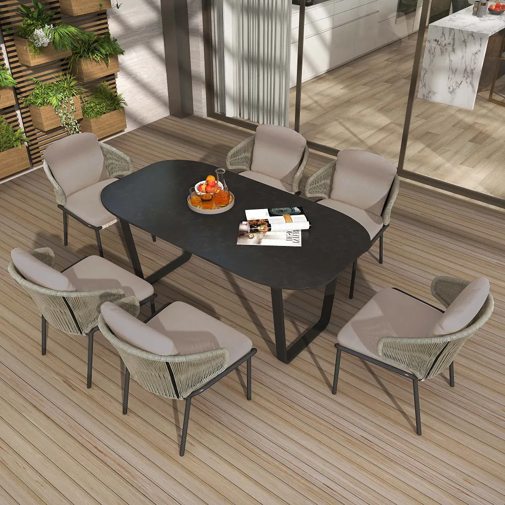 7-Piece Oval Outdoor Dining Set with Rattan Armchairs