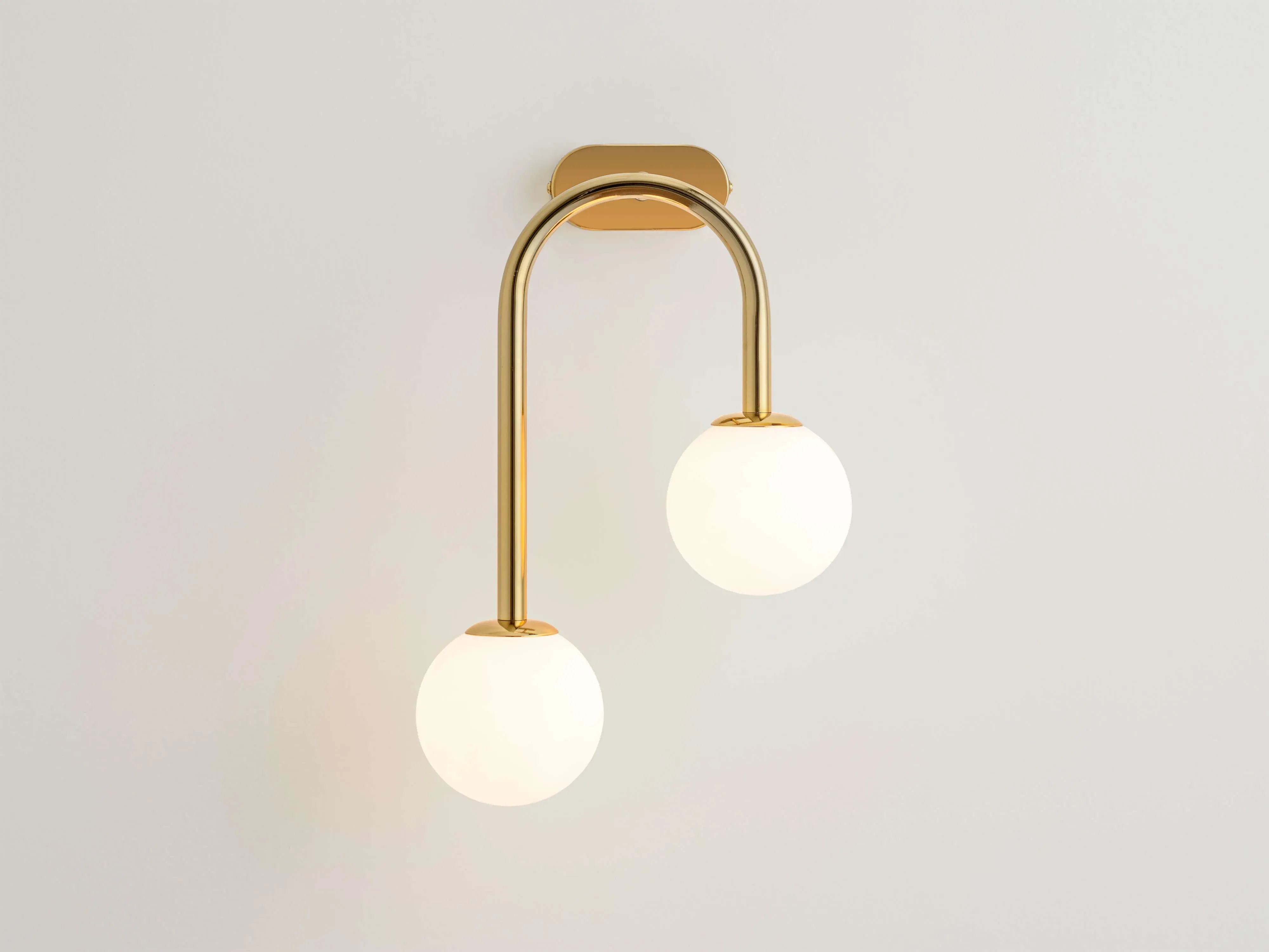 brass-drop-curve-wall-light image