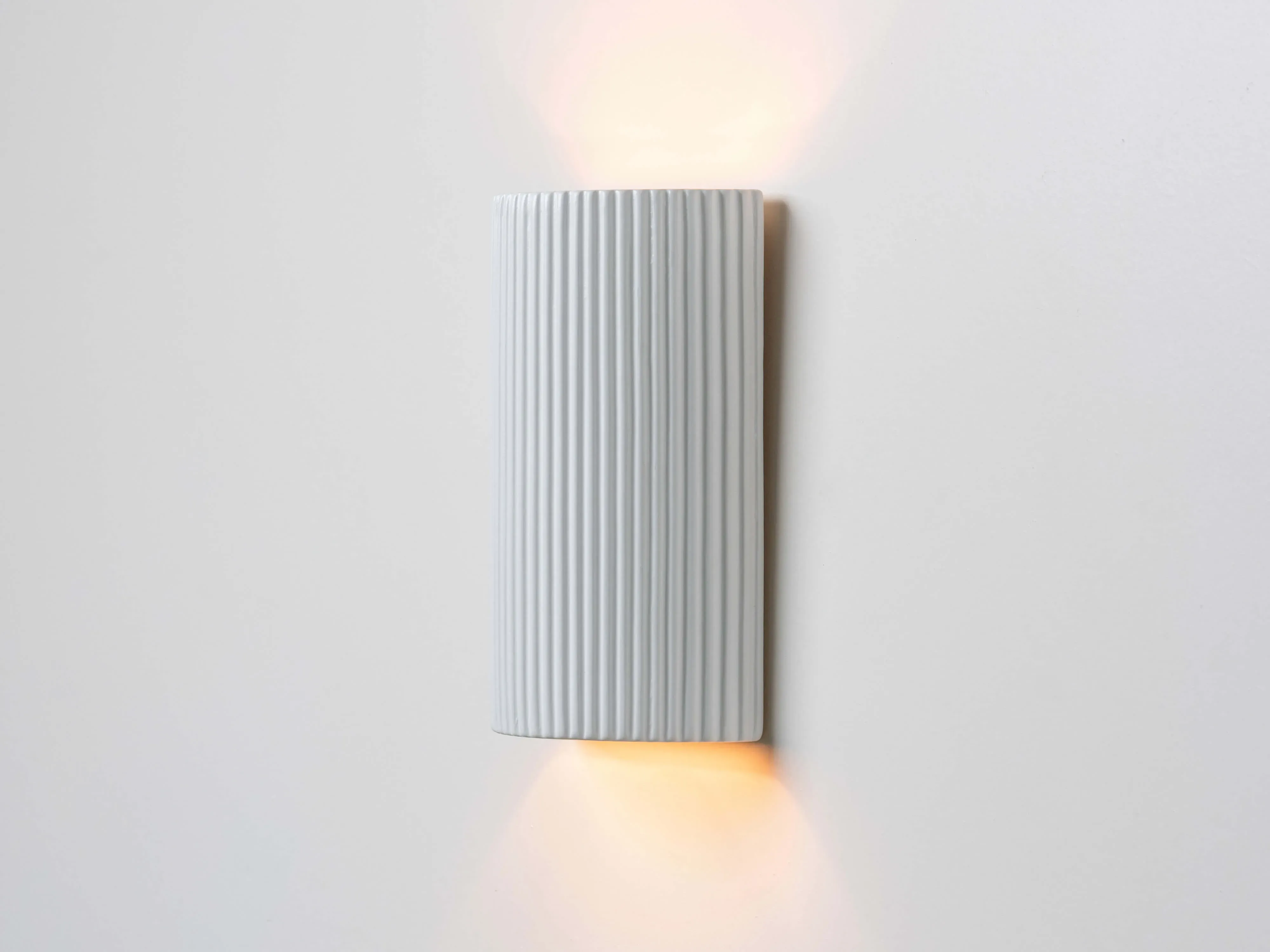 white-ribbed-ceramic-pillar-wall-light image