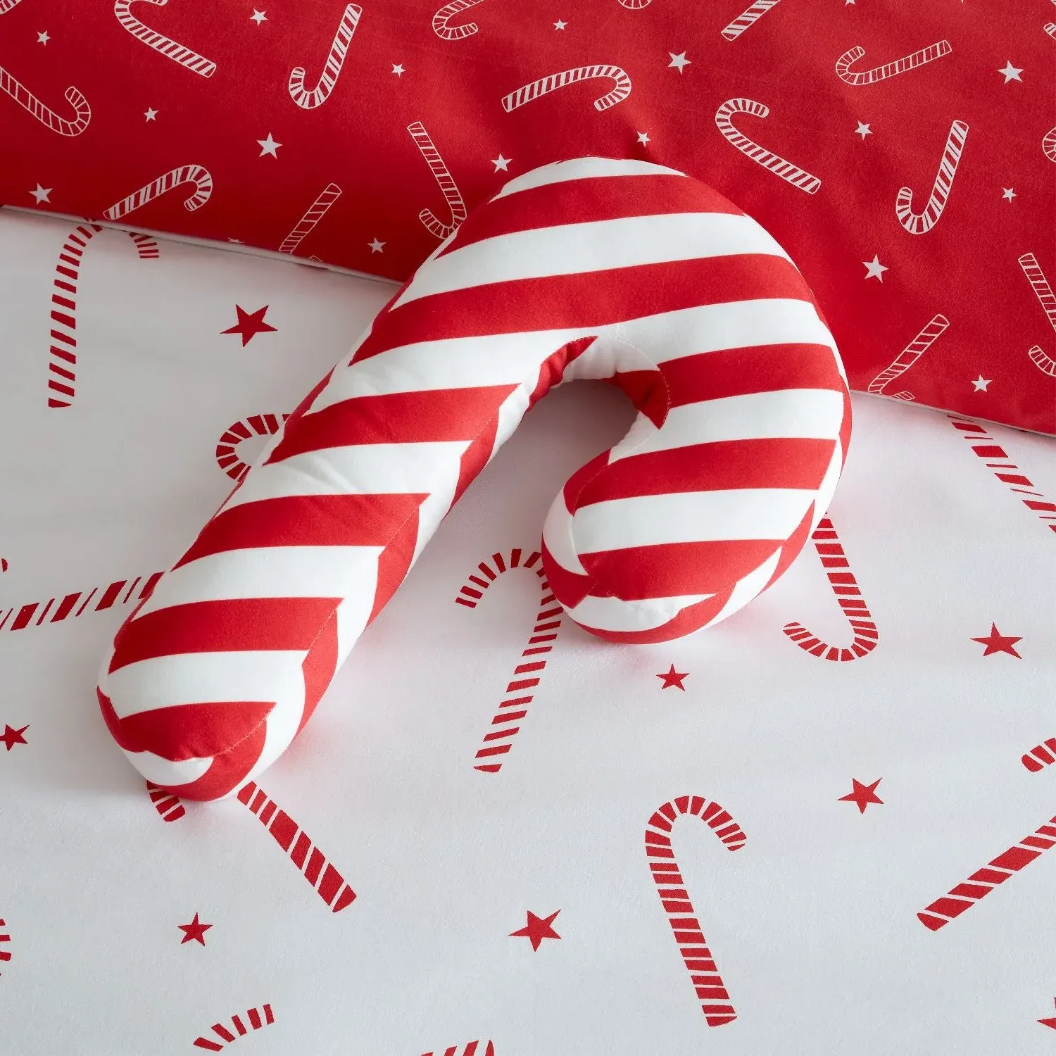 Catherine Lansfield Christmas Candy Cane Fleece Shaped Cushion - Red by Julian Charles