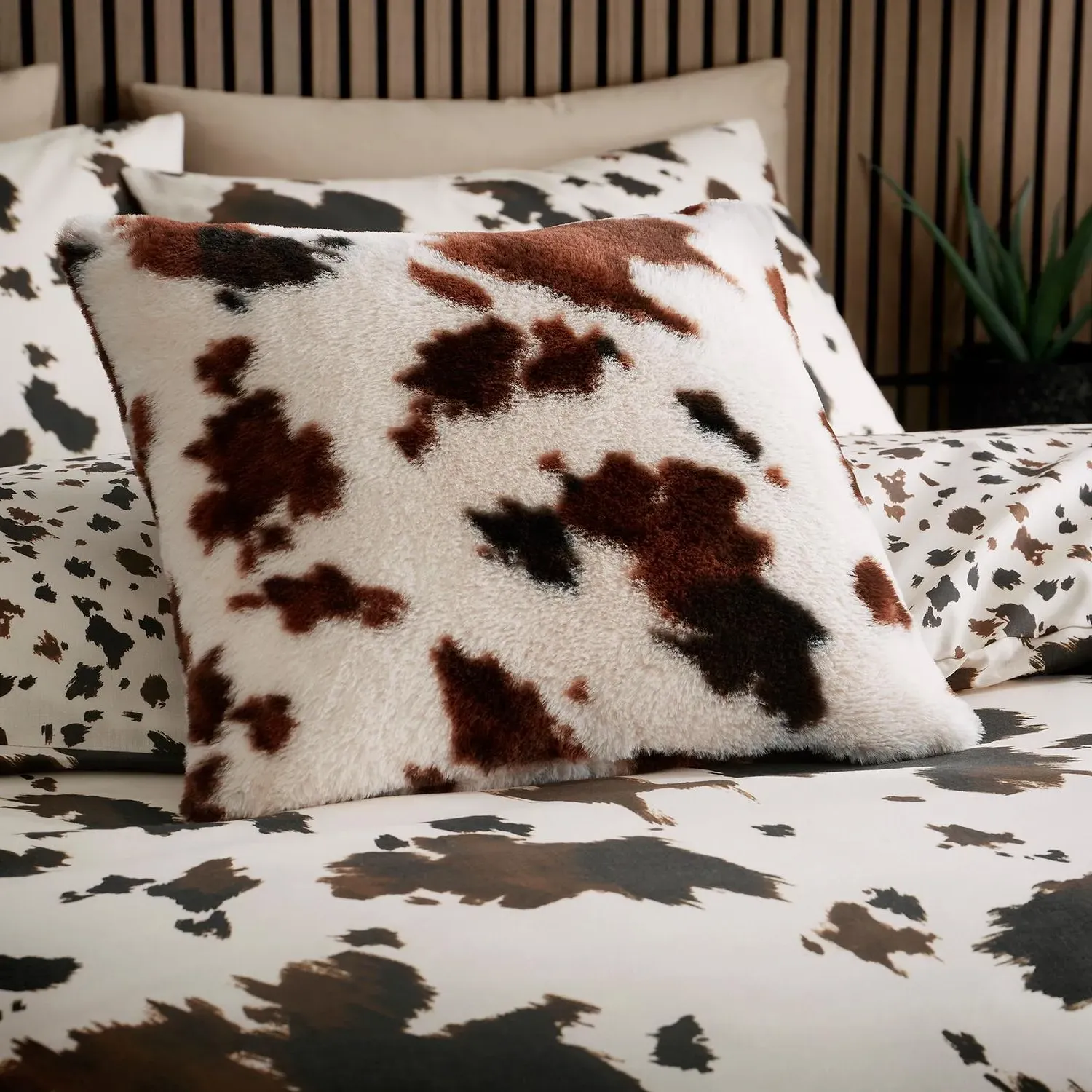 Cow Print Faux Fur Cushion - Brown by Julian Charles, alternate view