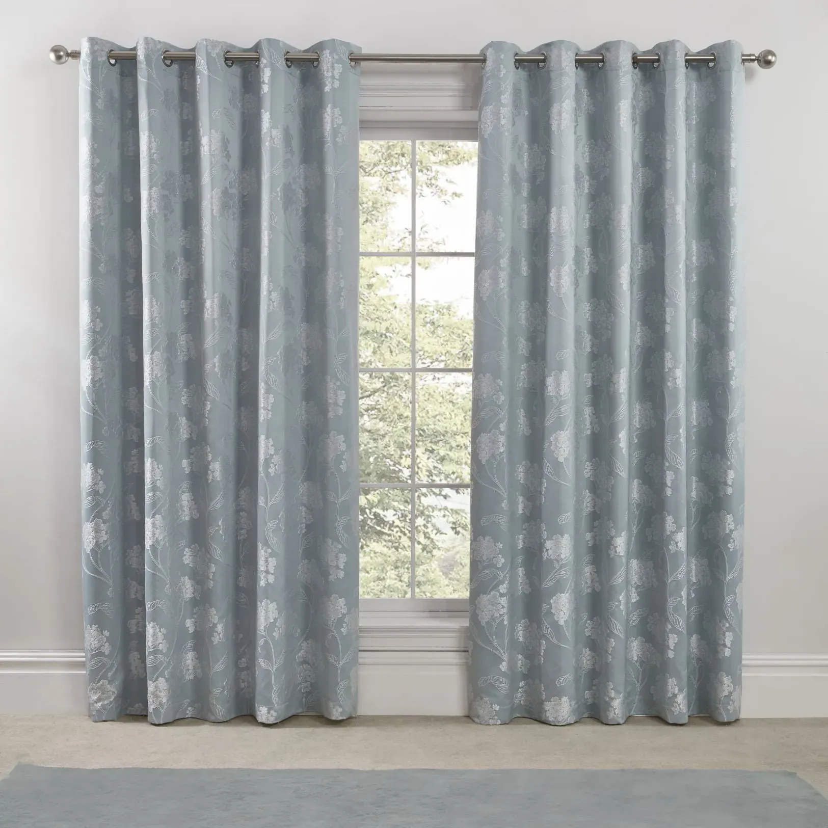 Lined Eyelet Curtains with Floral Design - Blue