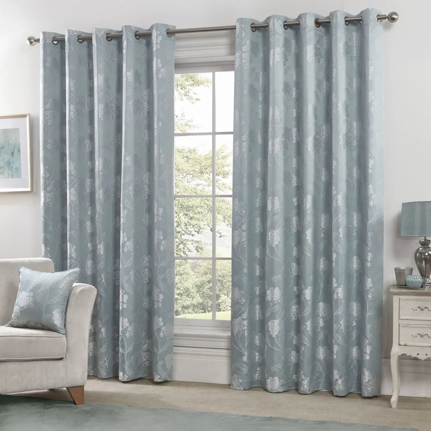 Lined Eyelet Curtains with Floral Design - Blue image