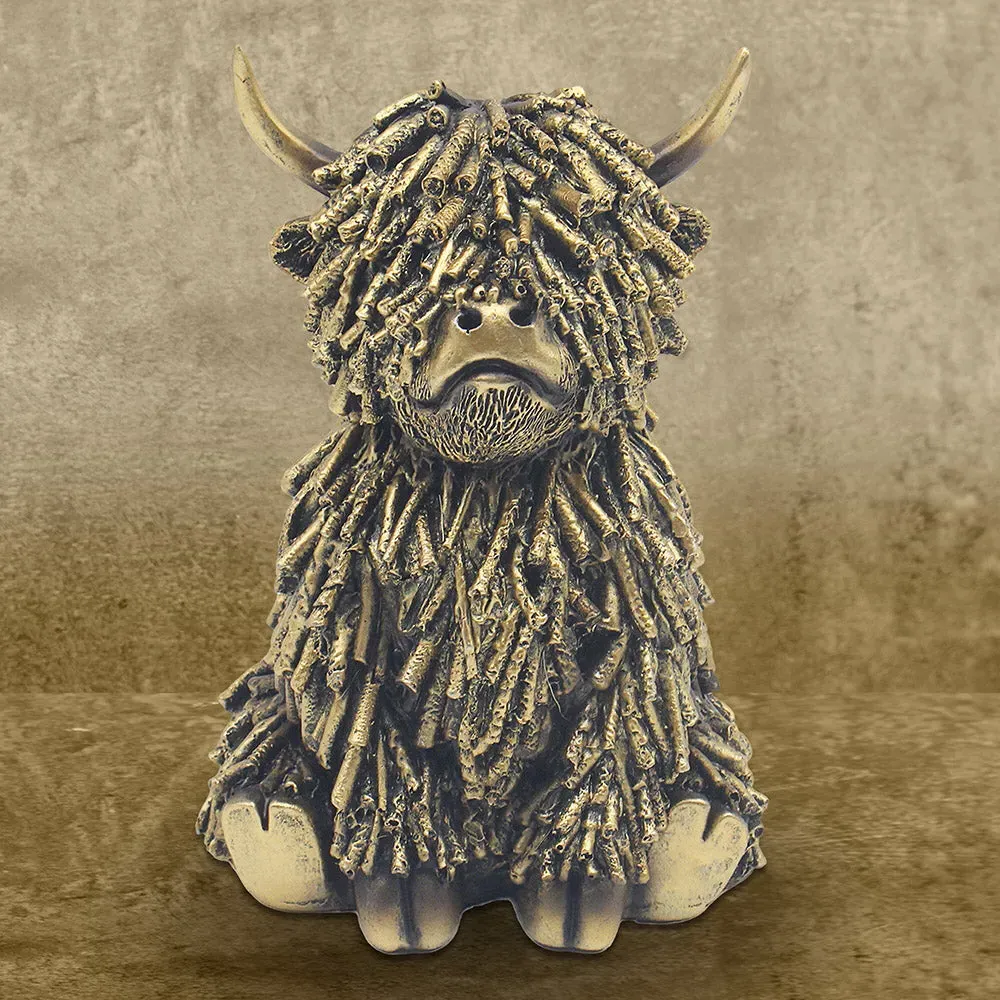 Sitting Shaggy Highland Cow Ornament - Gold, Resin by Julian Charles