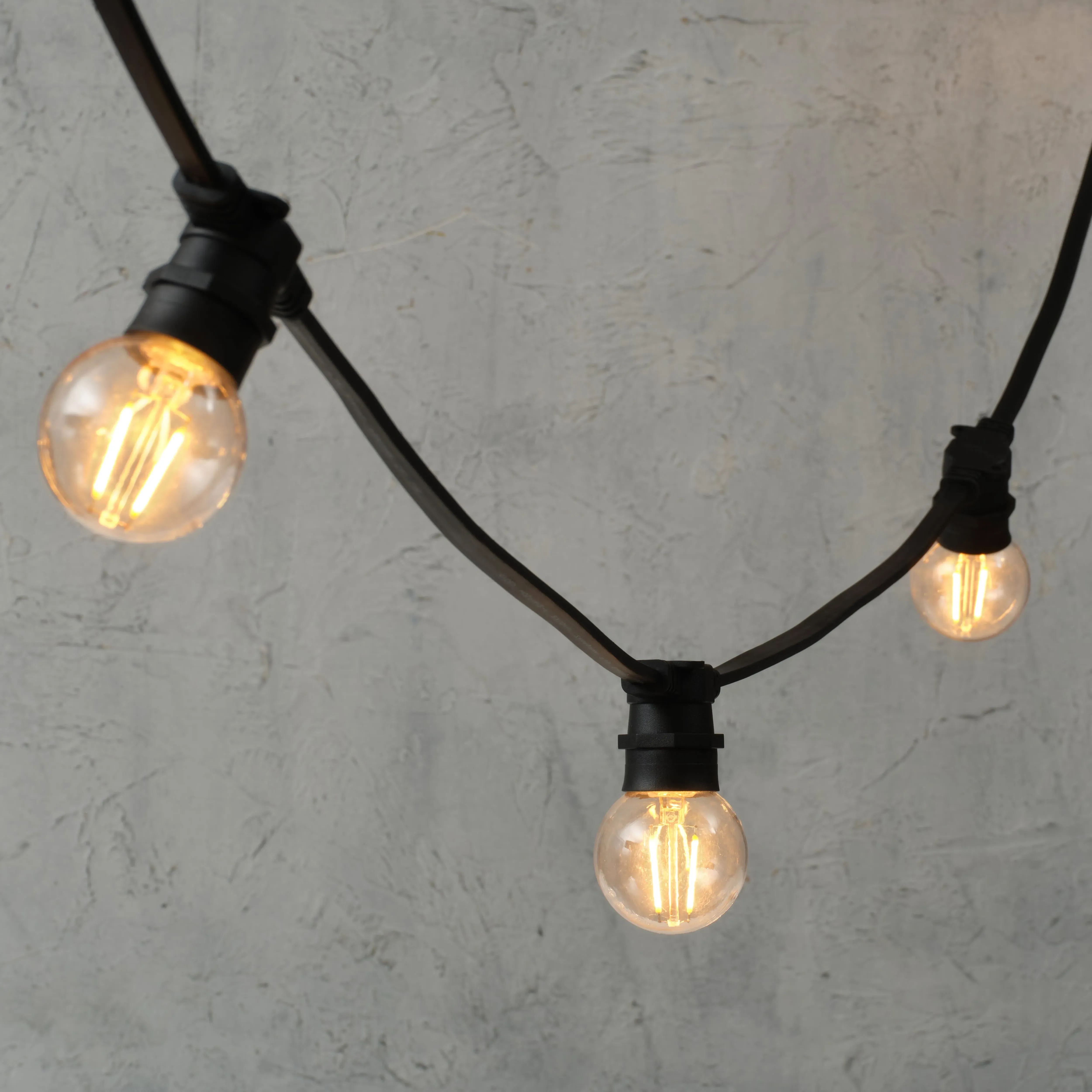 Plus Connect 20m Connectable Festoon Lights G60 Bulb - Warm White, Black Cable product