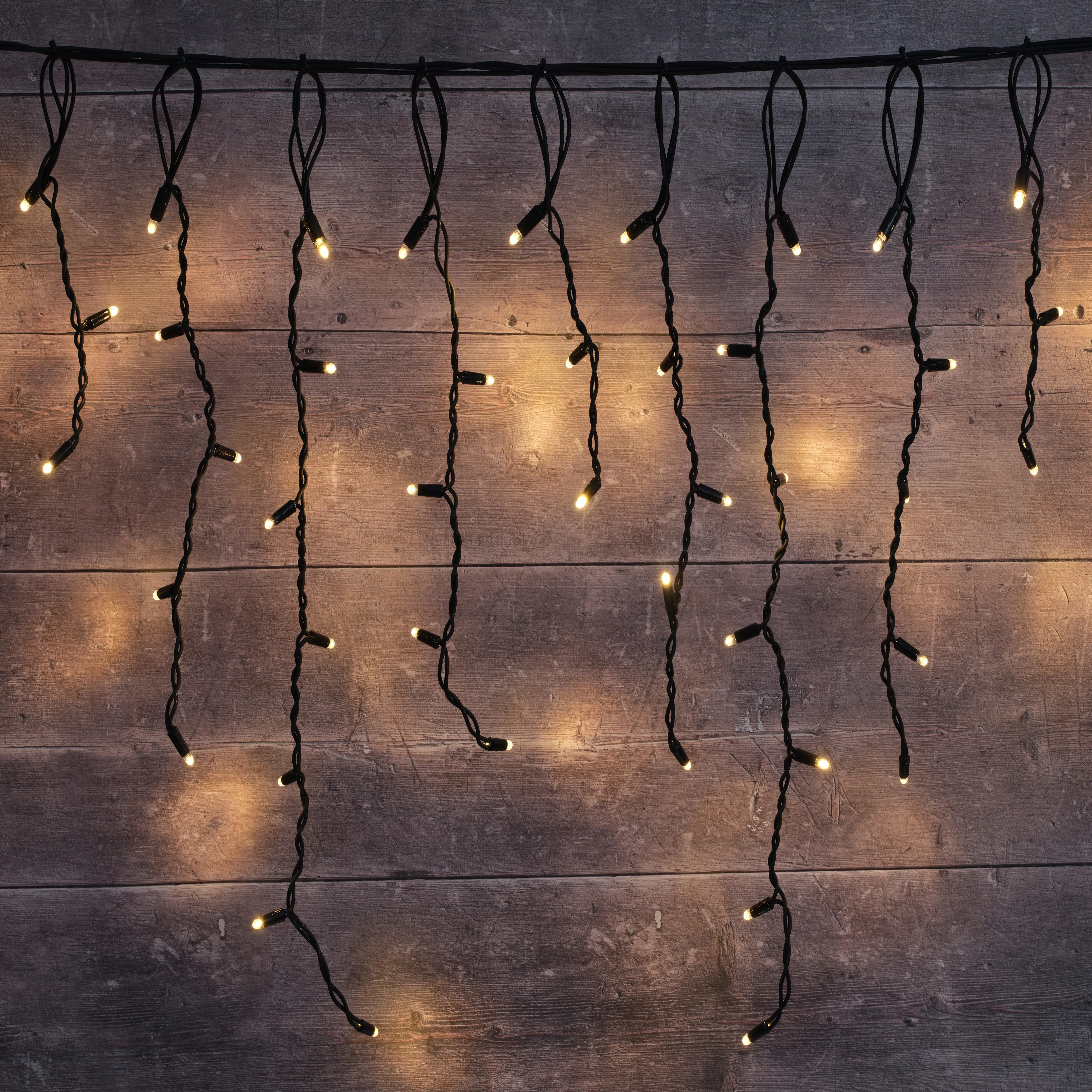 Plus Connect 42m Icicle Lights 2100 LEDs - Warm White, Black Cable product