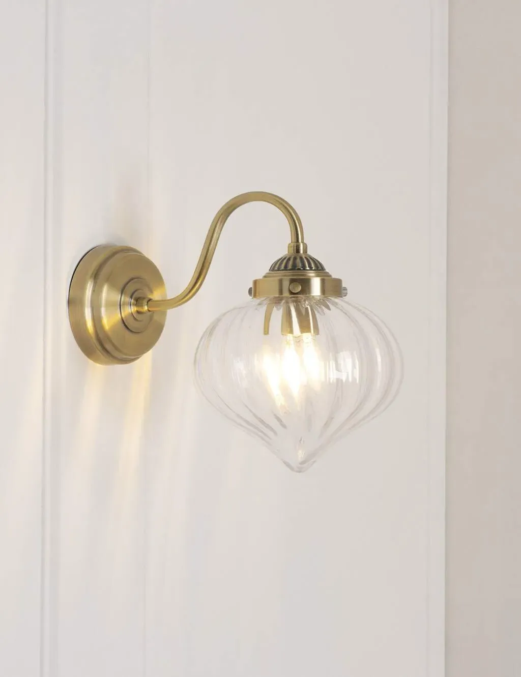 Whitham Fluted Glass Wall Light - Antique Brass product
