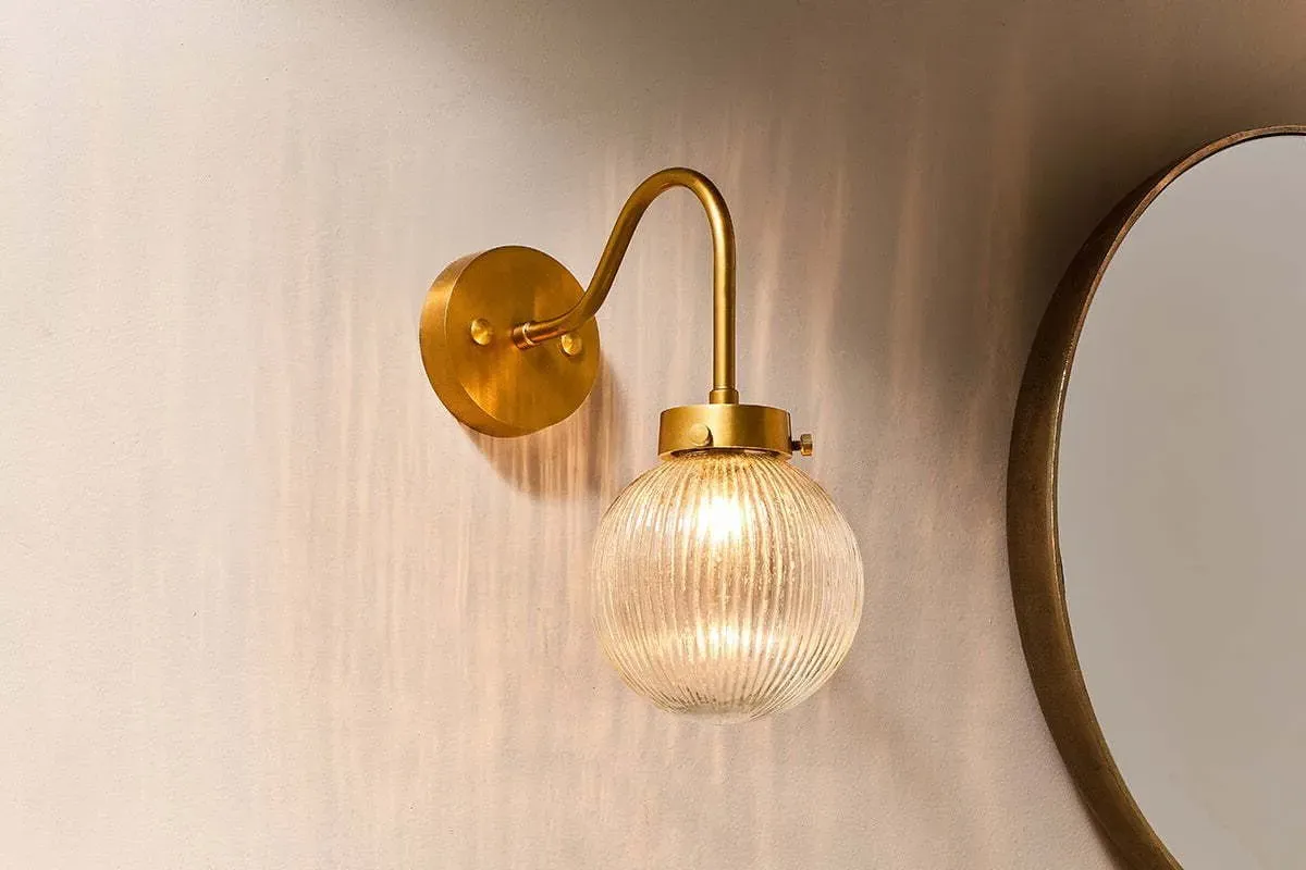 Konnie Globe Wall Light - Clear, Brass product
