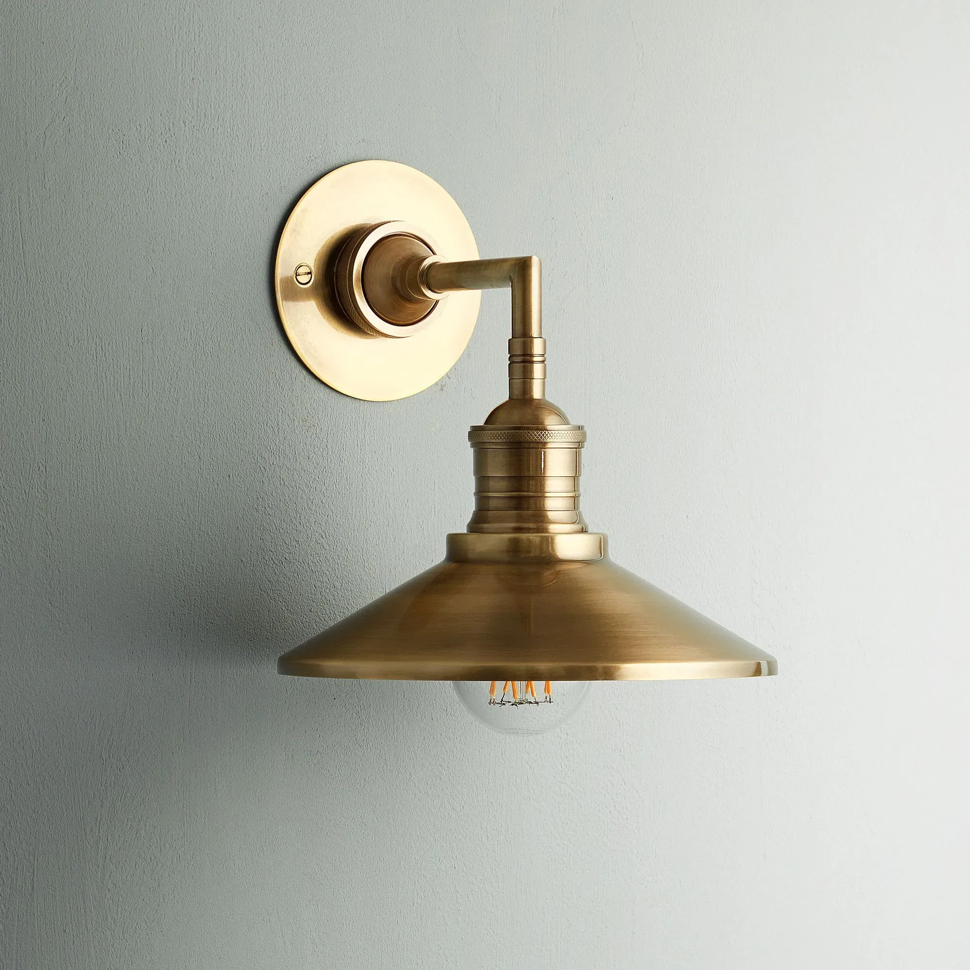Whizzer Wall Light - Antique Brass product