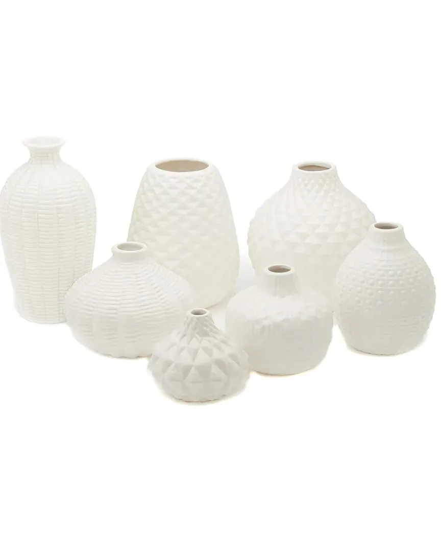 Set of 7 Artisan Carvings Vases - Ceramic image