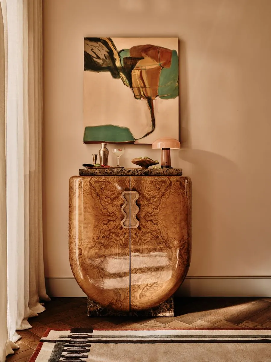 Huxford Bar Cabinet - Ash Burl, Marble product
