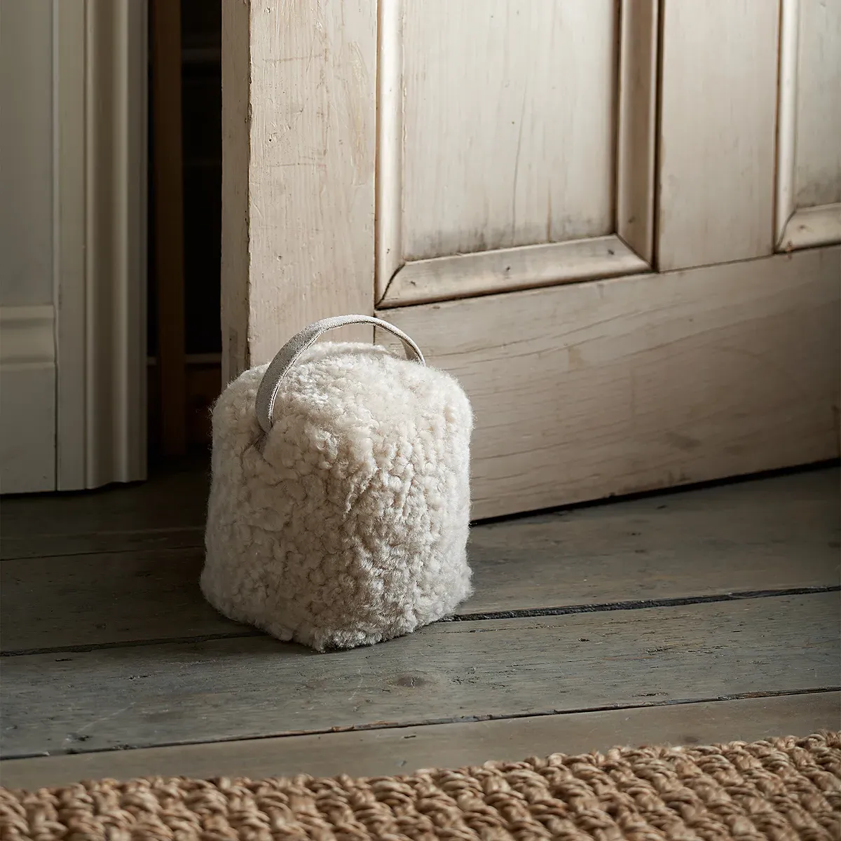 Curly Sheepskin Doorstop - Oatmeal product