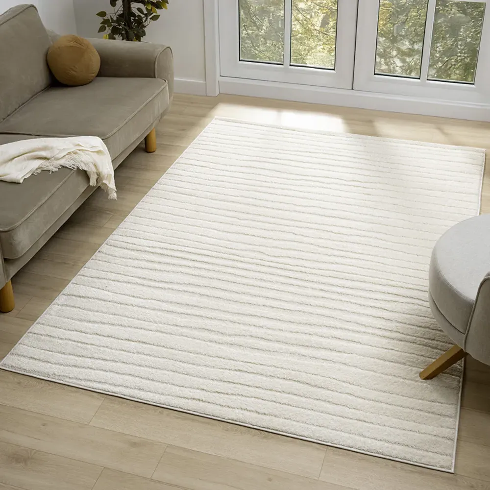 Aya Embossed Lines Area Rug - Cream