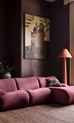 A boucle sofa in a pale sitting room