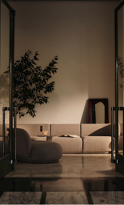 A green velvet three-seater