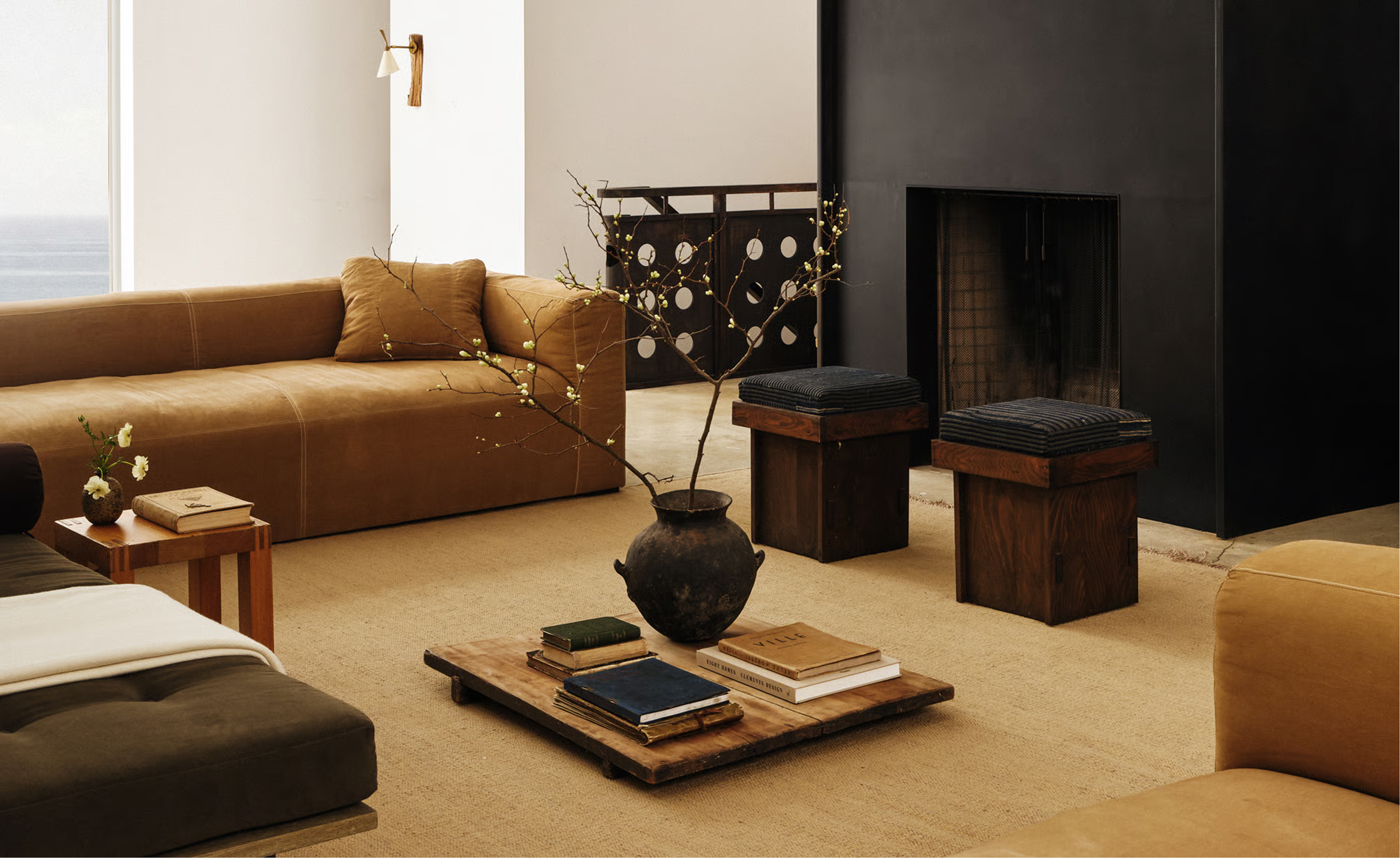 A deep linen sofa in a bay window