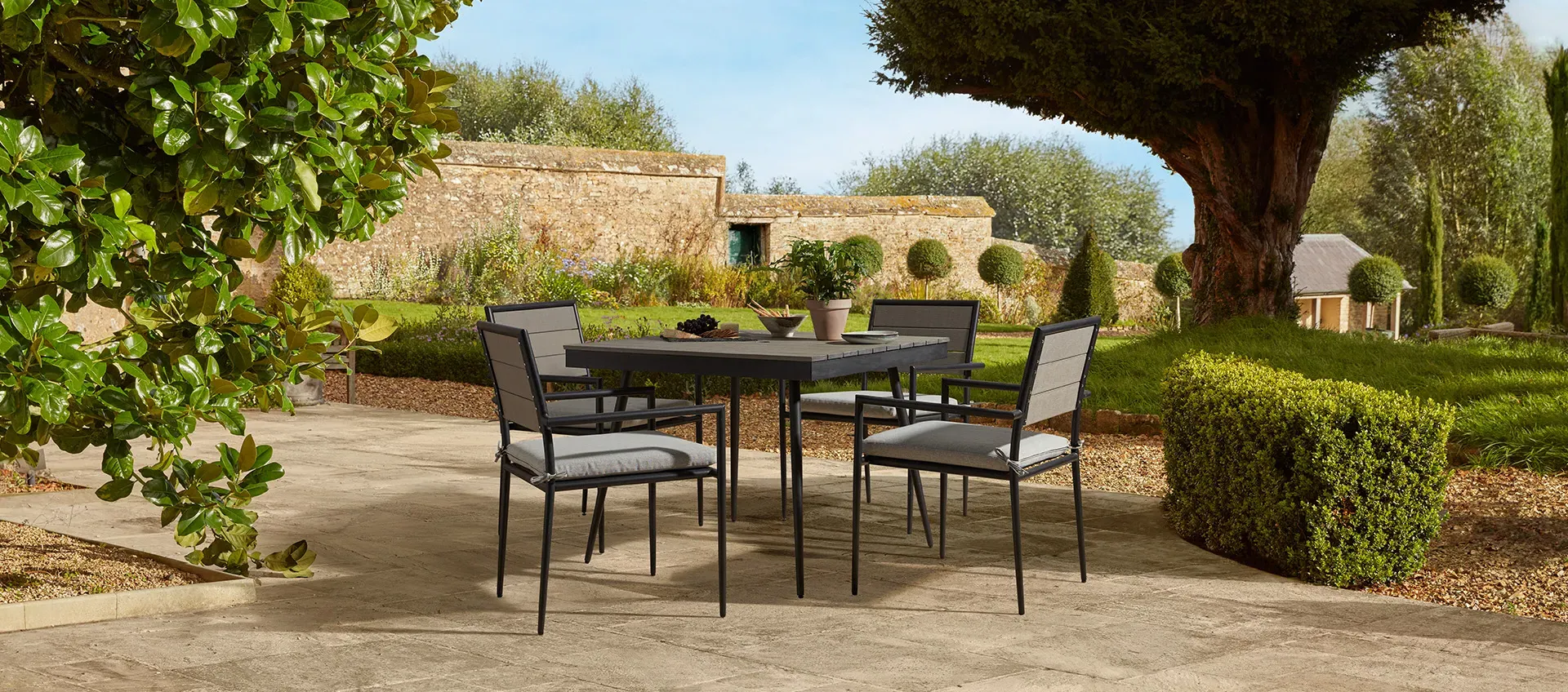 4-Seat Dining Set with Cushions - Composite Wood image