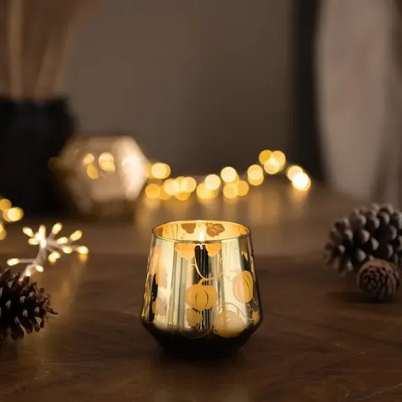 Pumpkin Candle with Spiced Fragrance - Green Glass image
