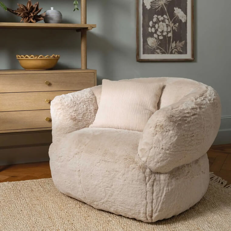 Cream Curved Faux Fur Swivel Chair