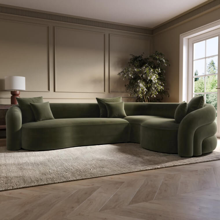 Zuri Green Velvet Right Hand Facing 4 Seater Curved Corner Sofa in room